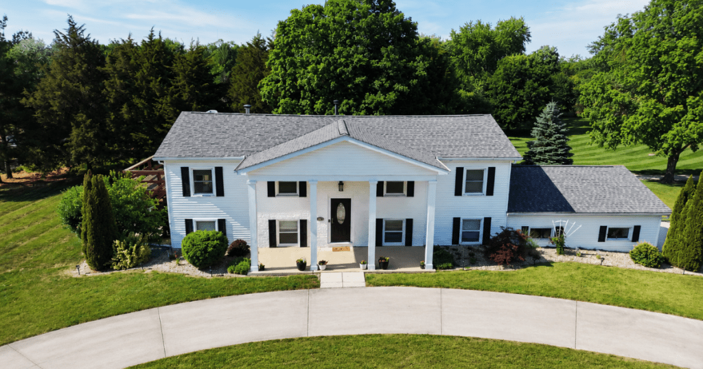 Stately white house photo using aerial phtography